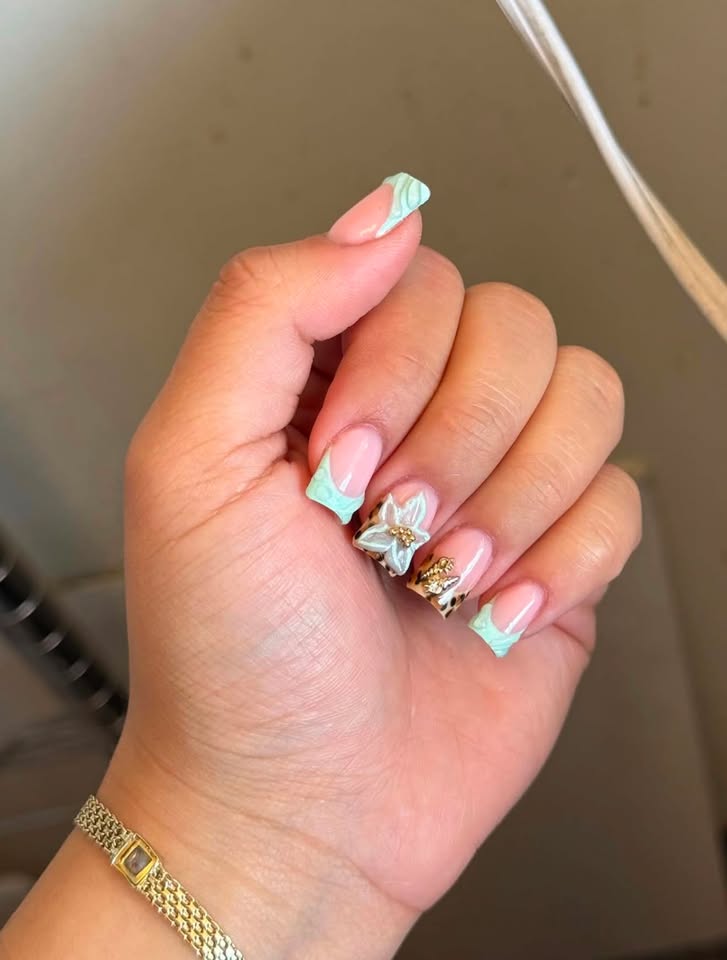 Mint French manicure with a large bow detail
