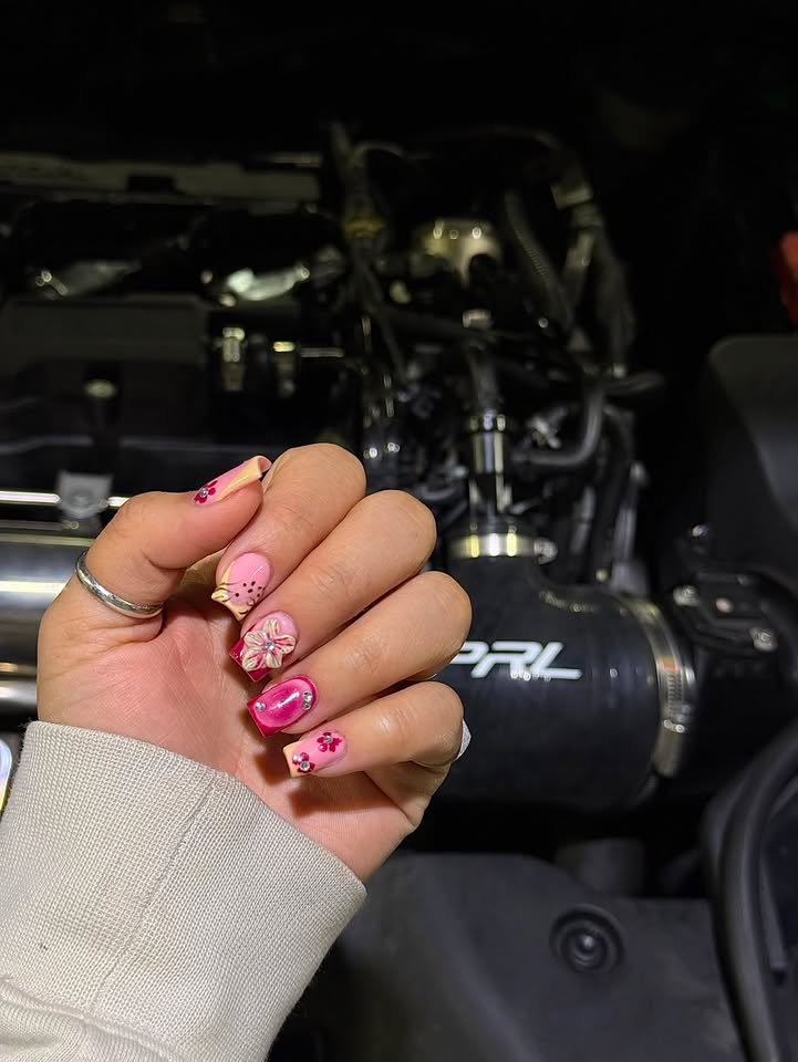 Bright pink butterfly nail art